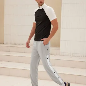 Men's loose tear-away basketball pants with side snap buttons and sporty grey finish