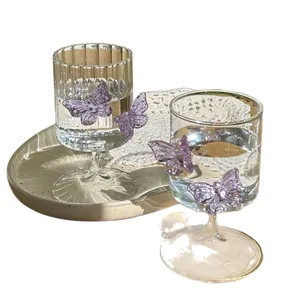 Elegant borosilicate glass goblet with purple butterfly decor for juice or cocktails