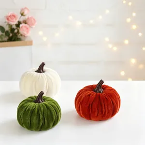 Set of three colorful decorative velvet pumpkins for Halloween and Thanksgiving decor