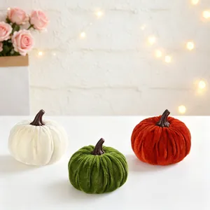 Decorative velvet pumpkins set of three in autumn colors for festive home decor display