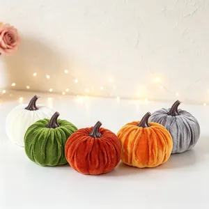 Handmade set of five colorful velvet pumpkins in autumn shades for home decor