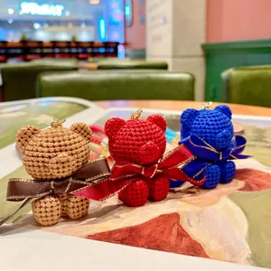 Cute resin bear keychains with woven texture and ribbons in three vibrant colors