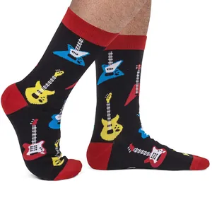 Detailed shot of black cotton crew socks with vibrant electric guitar patterns and red trim