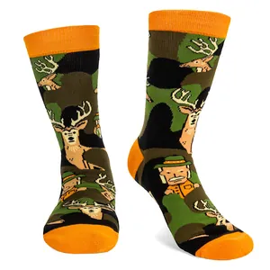 Macro view of hunting-themed crew socks featuring camouflage deer and hunter