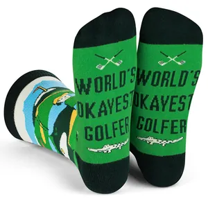 Green cotton socks featuring 'World's Okayest Golfer' text and golf graphics
