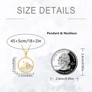 Stainless steel mountain pendant necklace size details with US quarter for scale
