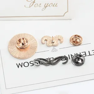 Detail view of mustache alloy lapel pins showing secure butterfly clutch backs