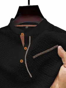 Close-up macro detail of men's black ice silk mesh T-shirt with breathable waffle texture