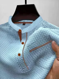 Close-up of light blue ice silk t-shirt showing breathable mesh texture