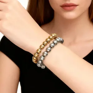 High-quality 304 stainless steel gold and silver bead elastic bracelets on wrist