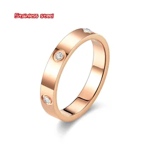 Elegant rose gold stainless steel ring featuring multiple sparkling crystal insets