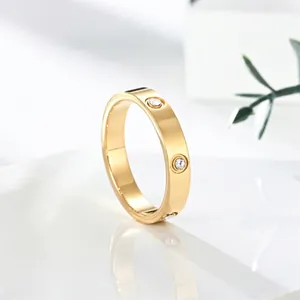 Elegant rose gold stainless steel ring with sparkling cubic zirconia stones for women.