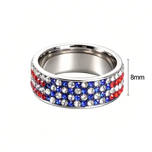 Detailed macro view of an 8mm stainless steel ring featuring red white and blue crystal pavé