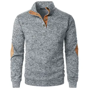 Close-up of men's grey knitted sweatshirt with stand collar and brown elbow patches