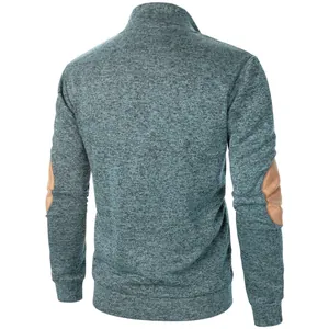Back view of men's heather blue stand collar sweatshirt with brown elbow patches.