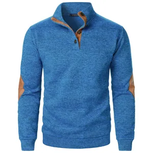 Close-up of men's blue heathered knit sweatshirt with brown elbow patches