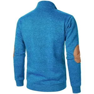 Back view of men's blue jacquard sweatshirt with brown faux leather elbow patches