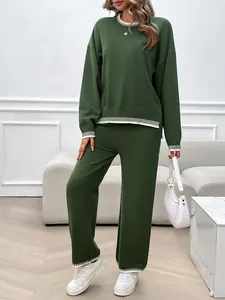 Casual dark green two-piece loose knit sweater and pants set with white striped hems