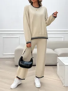 Beige long-sleeved two-piece knit set for women featuring striped ribbed trim details