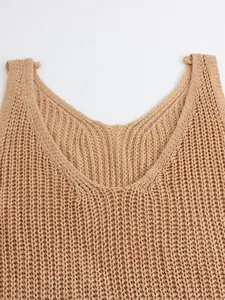 Close-up detail of a women's light brown knitted summer vest showing V-neckline texture