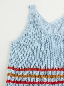 Close-up view showing the soft knitted texture of a light blue summer vest with stripes