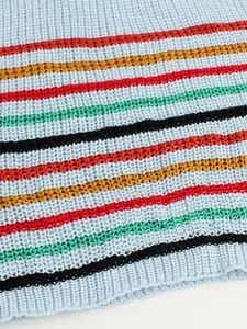 Close-up of multicolored striped crochet pattern on lightweight summer knitted vest