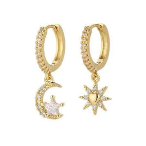 Gold star and moon hoop earrings with heart charm and sparkling zircons