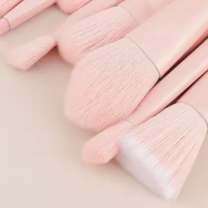 Macro detail of soft pink synthetic bristles from a professional makeup brush set