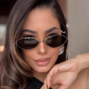 Retro metal oval sunglasses with dark lenses for outdoor UV protection