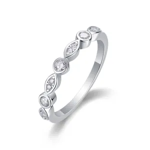 Elegant 925 sterling silver moissanite ring featuring marquise and round bezel-set stones