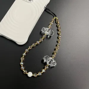 Detailed view of handmade acrylic beaded phone charm strap with clear bubble cloud charms