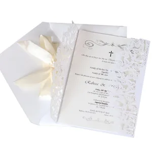 Elegant laser-cut butterfly wedding invitation card with white envelope and ribbon