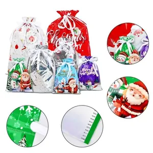 Detailed view of Christmas drawstring gift bags with various festive holiday patterns