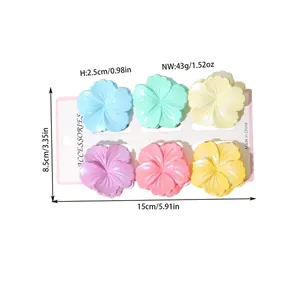 Set of six colorful plumeria flower hair claw clips with specific product dimensions