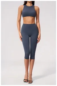 Full view of women's high-waist brushed yoga set in slate blue on a fitness model