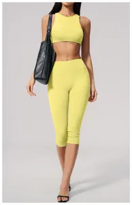 Close-up detail of women's vibrant yellow high-waisted yoga set for outdoor fitness