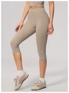 Detailed view of khaki high-waist brushed yoga capri leggings for athletic women