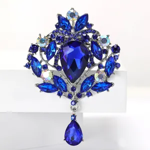 Luxurious royal blue teardrop crystal brooch with marquise rhinestones in silver finish