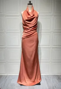 Elegant coral halter neck backless satin maxi dress with a draped cowl neckline