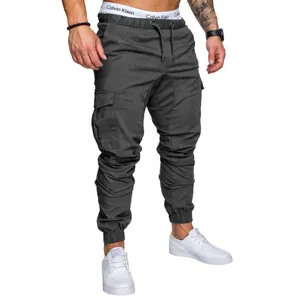Stylish men's dark grey cargo joggers featuring a drawstring elastic waist and pockets