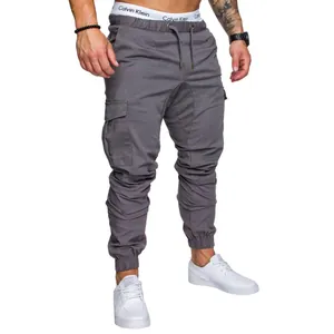 Men's stylish grey cargo jogger pants featuring drawstring elastic waist and pockets