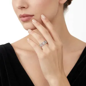 Elegant S925 sterling silver ring featuring moissanite stones on a female hand.