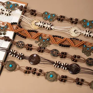 Bohemian retro hand-woven waist chains featuring ethnic fringe and bead details for dresses