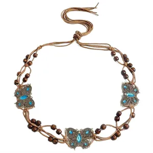 Vintage Bohemian hand-woven waist chain with wooden beads and blue butterfly charms