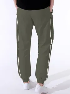 Men's high street olive green windbreaker parachute pants with white side stripes