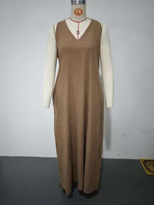 Casual brown cotton linen sleeveless maxi dress with V-neck and pockets on mannequin