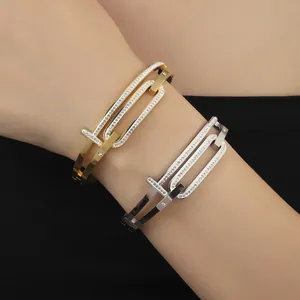 Elegant titanium steel interlocking T-shaped bracelets with pavé diamond accents for women