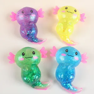 Set of four colorful glitter axolotl squishy toys for stress relief and kids' gifts
