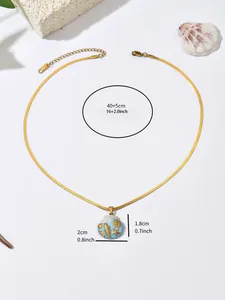 Detail view of gold-plated necklace with measurements of the ocean-themed shell pendant