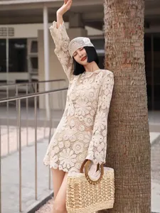 Elegant French style crochet lace mini dress with flared sleeves and floral pattern.